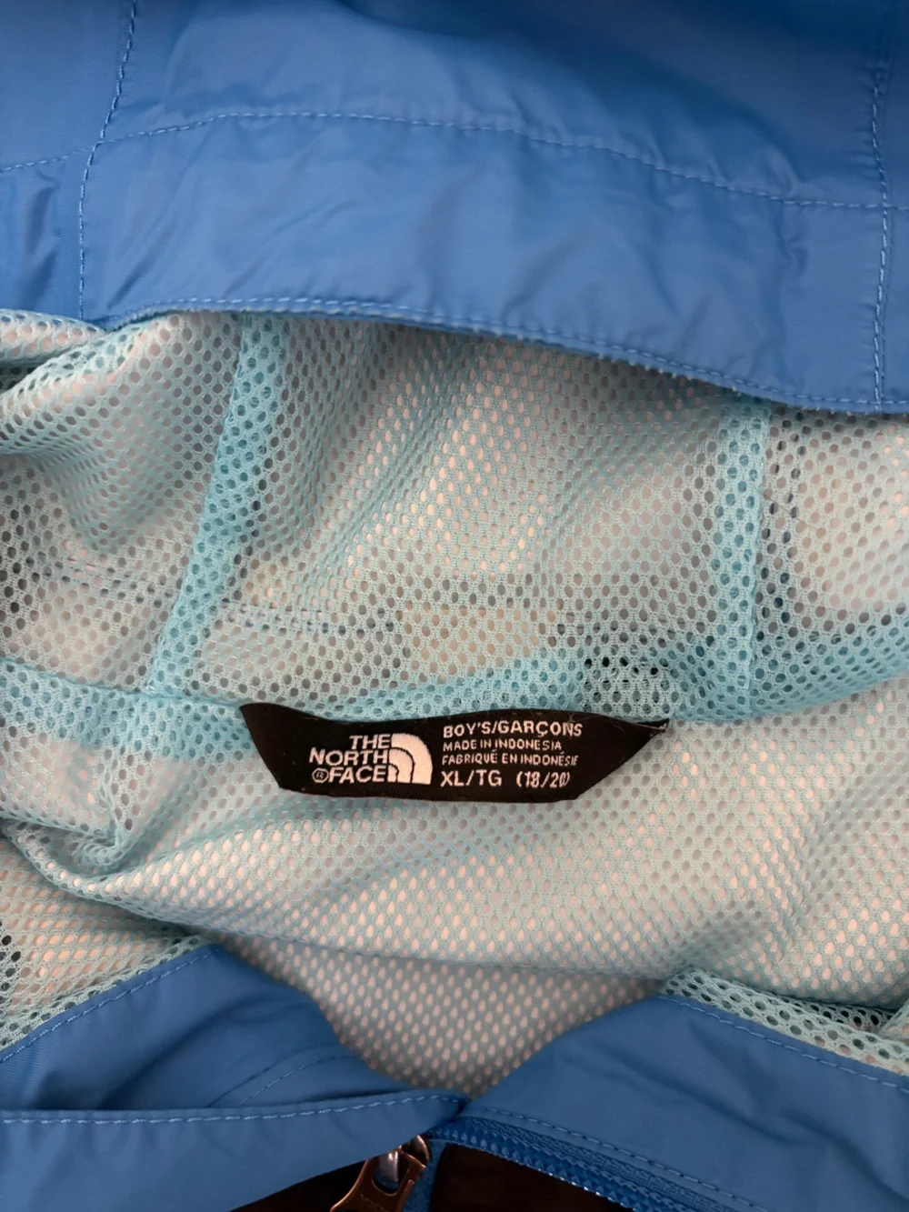 The North Face Blue and Black Hooded Rain Jacket